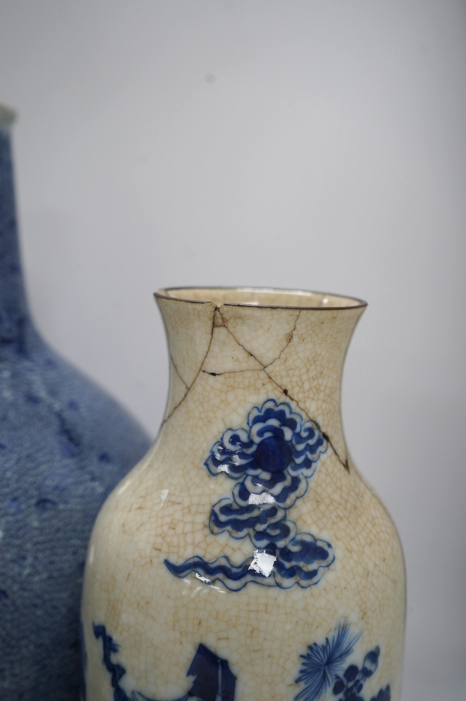 Four Chinese blue and white vases, a jar and cover and a tea bowl, Kangxi to 20th century, tallest vase 38cm high. Condition - poor